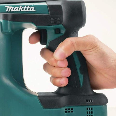 Close-up of hand gripping 18V LXT Cordless 2-Inch Brad Nailer With 110-Nail Magazine, lightweight design ideal for precision nailing.