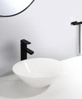 USZWBY Vessel Sinks Bathroom Sink Hotel Apartment Lampshade-Shaped Countertop Art Basin with black faucet and round white bowl.