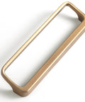Champagne Bronze Cabinet Pulls With Center Hole 5 Inch Length Modern Zinc Finger Handles for drawers, side view, anti rust plated hardware.