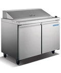 Rugged Heavy Duty Workhorse 15 Cubic Foot Commercial Refrigerator In Slick Stainless Steel with dual doors and adjustable shelving.