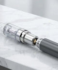 Eight Pack 510 Magnetic Thread Adapter Kit For Atomizers, Stainless Steel Universal Screw Converter Ring Connector, close-up view.