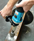 Heavy Duty Quarter Inch Sjs Die Grinder With Six Point Six Amp Motor Pushing Up To Twenty Eight Thousand Rpm Variable Speed Trigger in use on metal.