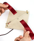 Hot Ribbon Cutter For Ribbons And Webbing, Electric Rope Cutter Machine 5V 2A demonstrated cutting red ribbon on wire