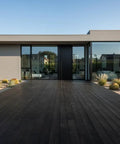 Pro Grade Reactive Water Based Wood Stain For Interior Or Exterior Creates A Badass Smoked Black Brown Finish on modern home deck.