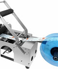 Pro Grade Semi Automatic Round Bottle Labeling Machine For Glass Pet Metal Containers Heavy Duty Stainless Build with labels.