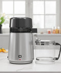 Countertop Water Distiller For Home Use 1 Gallon Stainless Steel With Glass Carafe 750W Desktop Purifier on kitchen counter.