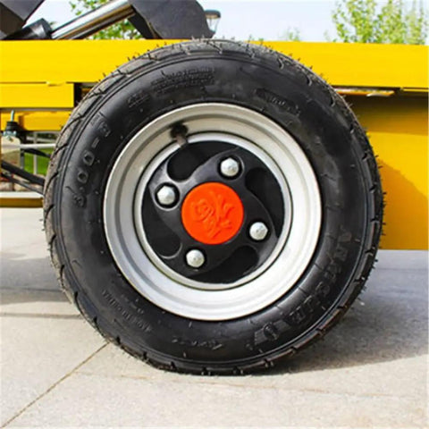 Close-up of rubber wheel on Heavy Duty Hydraulic Lift Platform With Smooth One Press Raising Thickened Steel Frame And Zero Hassle Four Wheel Maneuvering.