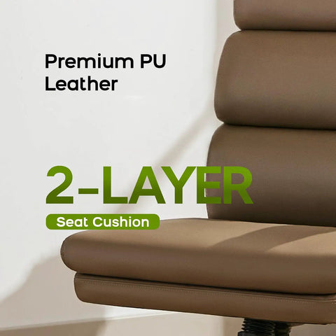 Close-up of tan seat cushion on tall drafting chair with padded flip up armrests, ergonomic leather backrest, adjustable footrest ring for standing desks.