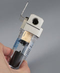 Hand holding Inline Pro Grade Air Filter And Moisture Trap With Automatic Drain For Shop And Garage, 26 CFM Separator