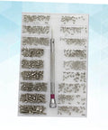Top view of Miniature Electronics Screw Kit For Repairs with assorted tiny screws and tools in organized case for glasses and gadgets.