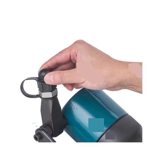 Hand adjusting the switch on Heavy Duty Electric Steel Bar Shear For Portable Rebar Cutting Machine With 8-32mm Range Quick Cut Action No Pump Needed Great For Diy Projects And Construction Sites Reliable Performance.