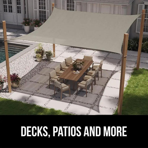 Heavy Duty Sun Shade Canopy 12 By 16 Ft Gray set up over outdoor dining area, providing shade on patio.