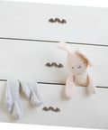 Image of a white dresser with Vintage Retro Drawer Handles Set For Jewelry Boxes And Small Cabinets Mini 56x17mm in antique gold color.