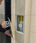 Hidden Tile Access Panel Aluminum Wall Inspection Cover 36X36 Inch being installed over plumbing in tiled wall.