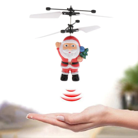 Hand Flying Ball Mini Induction RC Helicopter USB Rechargeable Toy Drone Santa design above a hand