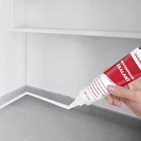 Person applying Advanced Silicone Caulk Sealant For Kitchen And Bath Waterproof Bonding Interior Exterior Use Heavy Duty Strong Adhesion Shrink Proof And Crack Resistant 5.3 Oz White to countertop edge
