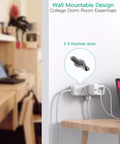 Heavy Duty Surge Protector Power Strip With 15 Foot Extension Cord Featuring 13 Outlets And Four Smart Usb Ports For Plug And Play Hella Smooth Multi Device Charging Setup mounted to wall with keyhole slots.