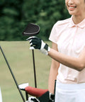 Golfer handing black Mallet Putter Headcover with Magnetic Closure for Heel Shafted Mallets on course