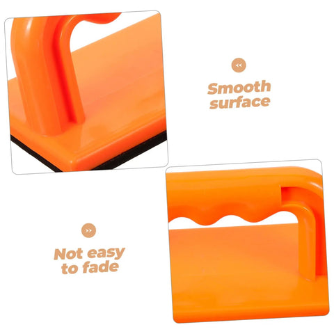 Close-up of Pro Grade Table Saw Safety Push Block For Woodworking showing smooth orange surface and durable construction