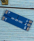 No Fuss 2 Pack 2S BMS For 18650 Lithium Cells 7 4V Balanced Charging Guard showing HX-2S-D01 circuit board with connection points.