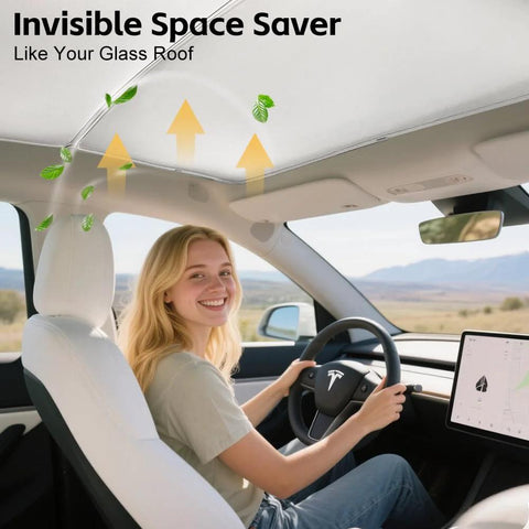 Tesla Model Y gray double-layer glass sunshade installed on the roof; driver in the front seat.