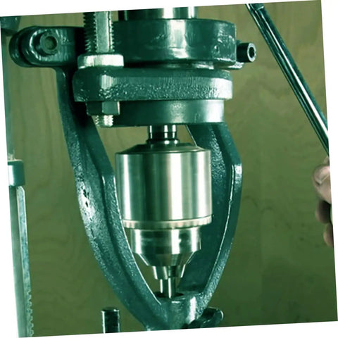 Iron Mortise Converter Runs Tight On Bench Drills Clips Right Onto Hollow Chisel Bits With Tenon Gauge Tool. Close-up of the device in use.