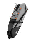 Waterproof Bike Seat Bag With Big Capacity Roll-Top Tail Pack Made From TPU Polyester showing side with straps and logo.