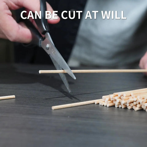 Person cutting Top Shelf 1/8 X 12 Inch Wooden Dowel Rods 150 Pack For Crafts And Diy Projects Ultra Smooth Hardwood Sticks.