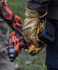 Person holding 20V Battery Powered Impact Driver With One Quarter Inch Hex Quick Connect 210 Foot Pounds Max Torque Brushless Motor