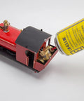 1/50 HO Live Steam Locomotive Model With Oscillating Steam Engine Kit For Adults Fun Hands On Train Model Kit Without Track Real Steam Power Science Toy Gift being fueled