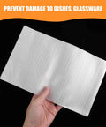 Hand holding White EPE Foam Pouch from 200 Pack For Packing And Shipping Cushioning And Shock Absorption Lightweight Flexible Protective Bags