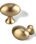 10 Pack Oval Champagne Bronze Cabinet Knobs And Furniture Pulls Single Hole Hardware Handle For Kitchen Cabinets Cupboards Dressers And Wardrobes Great For Modern Homes And Rustic Styles Easy Install Durable Finish, showing two knobs with a champagne bronze finish on a white background.