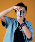 Boy using Instant Print Camera For Kids 16MP Inkless Prints With Digital Camera And Fun Frames Selfie Mode And Easy Controls Designed For Ages 3 To 12 A Kid Friendly Dope Mini Studio That Makes Birthday Gifts Feel Extra Cool.