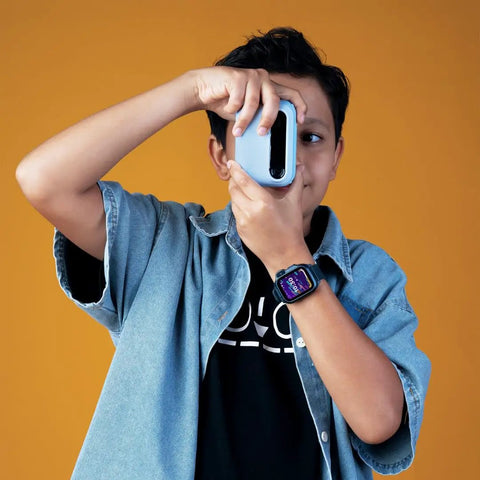 Boy using Instant Print Camera For Kids 16MP Inkless Prints With Digital Camera And Fun Frames Selfie Mode And Easy Controls Designed For Ages 3 To 12 A Kid Friendly Dope Mini Studio That Makes Birthday Gifts Feel Extra Cool.