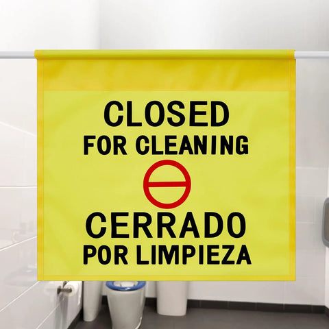 Restroom Closed For Cleaning Sign English And Spanish Hanging Doorway Safety Sign Yellow in a bathroom scene