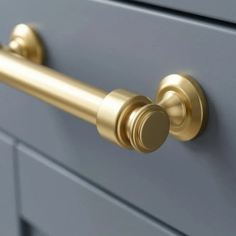 Close-up of Real Deal 5 Inch Brushed Gold Cabinet Pulls and 10 Pack Drawer Handles For Kitchen Refresh on a drawer.