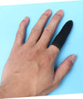 Hand wearing a black latex finger cot, part of the 1000 Pack Antistatic Finger Cots Providing A No Sweat Grip That Shields Precise Electronics.