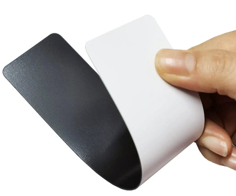 Close-up of a hand holding Instant Magnetic Door Lock Strips For Frames Quick No Fuss Lockdown Security Bar System For Schools And Offices.