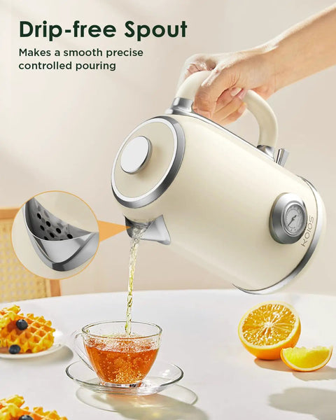 Pouring tea from a 1.8L Electric Kettle With Temperature Gauge, 1500W Fast Boil, 304 Stainless Steel Retro Style Hot Water Kettle