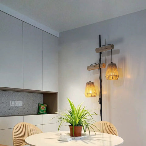 Two Light Rattan Floor Lamp With Independent Control Switch in cozy dining room setting with rustic lampshades, 68-inch tall.