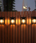 12 Pack Solar Fence Lights Outdoor Waterproof Lighting For Fence Garden Yard Deck And Stairs Auto On Solar Powered Weatherproof No Hassle Install Bright Warm Glow To Elevate Pathways And Patio Ambience installed on wooden fence