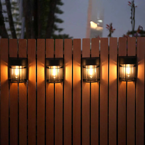 12 Pack Solar Fence Lights Outdoor Waterproof Lighting For Fence Garden Yard Deck And Stairs Auto On Solar Powered Weatherproof No Hassle Install Bright Warm Glow To Elevate Pathways And Patio Ambience installed on wooden fence