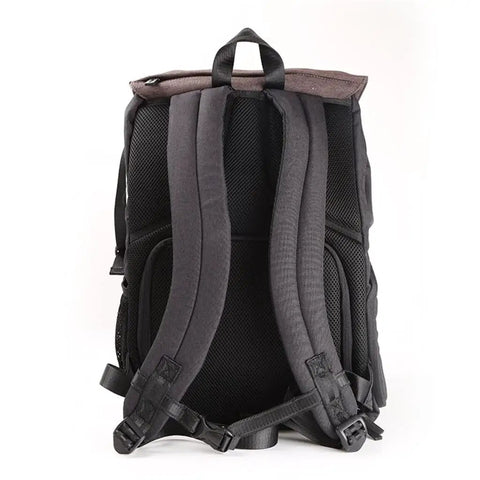 Back view of large capacity camera backpack with rain cover waterproof fabric for 15.6 inch laptop and DSLR, showing straps.