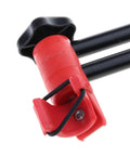 Close-up of red clamp on Lightweight Aluminum Bike Repair Rack Triangle Stand For Road Bikes Foldable Floor Display Stand In Red Durable And Stable Space Saving Easy Setup For Home Garage Or Shop Slips Proof Support.