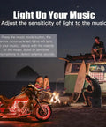 Lit 8 Piece Motorcycle Underglow LED Light Kit With App Control Multicolor RGB Strips illuminating a parked bike at night