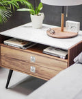Wooden side table with two pack stainless steel flush ring pull handles for marine hatches cabinets and doors, decor items on top.