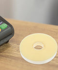 Heavy Duty Strapping Tie For Machines And Box Packaging Pro Grade Fast Easy Packing Tape For Shipping shown on table