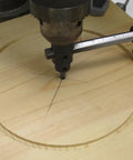 Heavy Duty Circle Cutter For Drill Press, Adjustable From 1 3/4 Inches To 7 7/8 Inches, cutting a circle in wood on a drill press