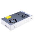 600W 12V 50A Enclosed Power Supply, 1U Low Profile Space Saving Design, Wide Input 90-264VAC or 255-370VDC, Switchable For 115/230VAC, Rack Friendly Power For Tight Control Cabinets And Industrial Racks, silver metal case with fan