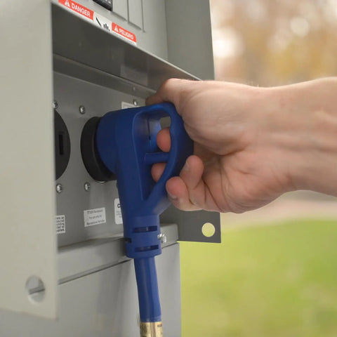 Person plugging RV Extension Cord 25 Feet 30 Amp TT-30P To TT-30R Heavy Duty With Elbow Plugs into power source outdoors.